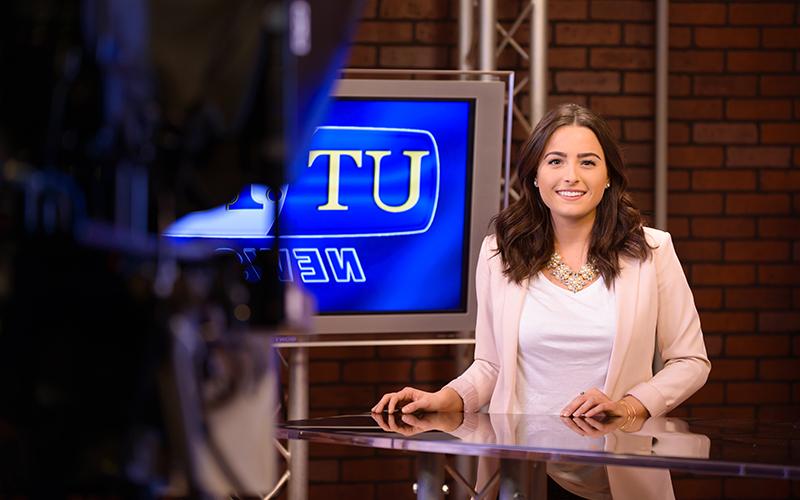 UToledo Student stands on broadcast set