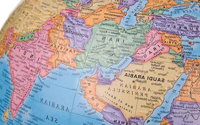 close up image of a globe featuring countries of the middle east